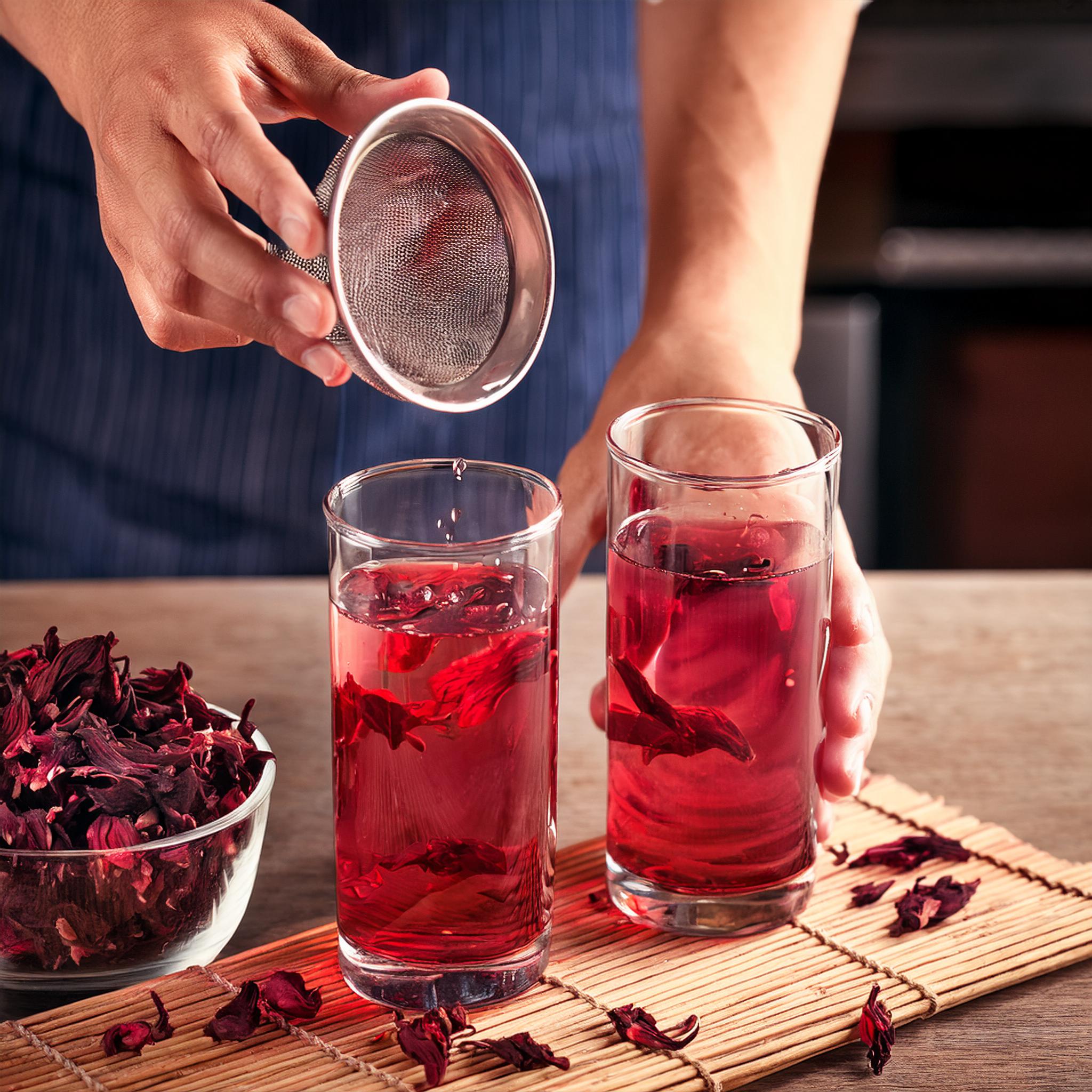 Show Puting 4 6 hibiscus petals or powder in 2 glass of cold water